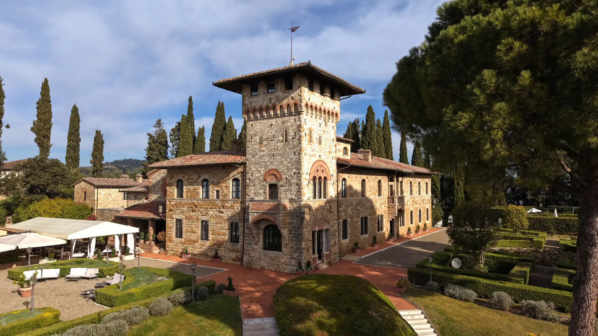 Aerial view of La Collegiata with medieval tower, geometric gardens and historic Tuscan architecture - La Collegiata, BZAR hotels in Tuscany